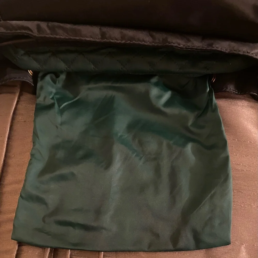 TORY BURCH- EUC Perry Black Nylon Quilted Green Interior Flap Cinched Backpack